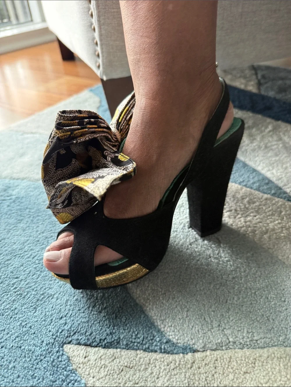 Black Suede Platform Heels with Decorative Gold-Patterned Bow